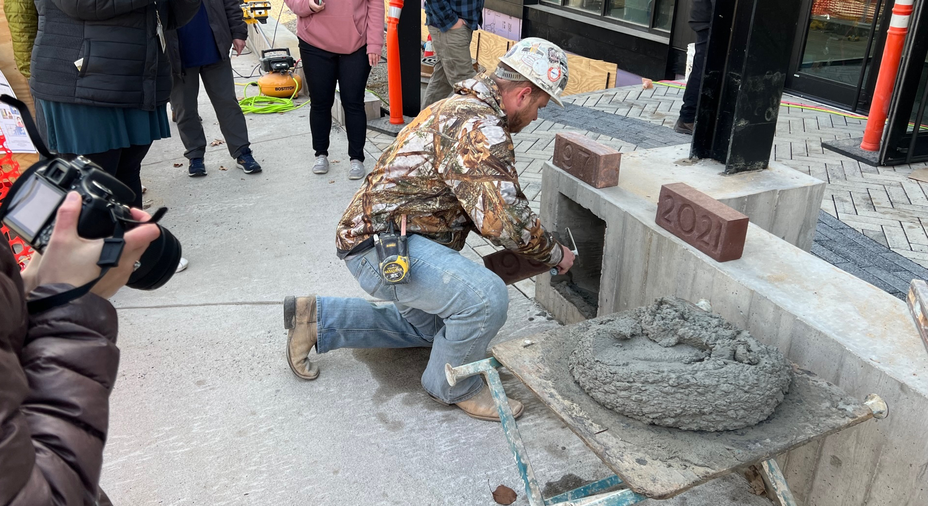 Inserting the time capsule. (Graham photo) 2024/01/New-Time-Capsule-2-MarkS.jpg 