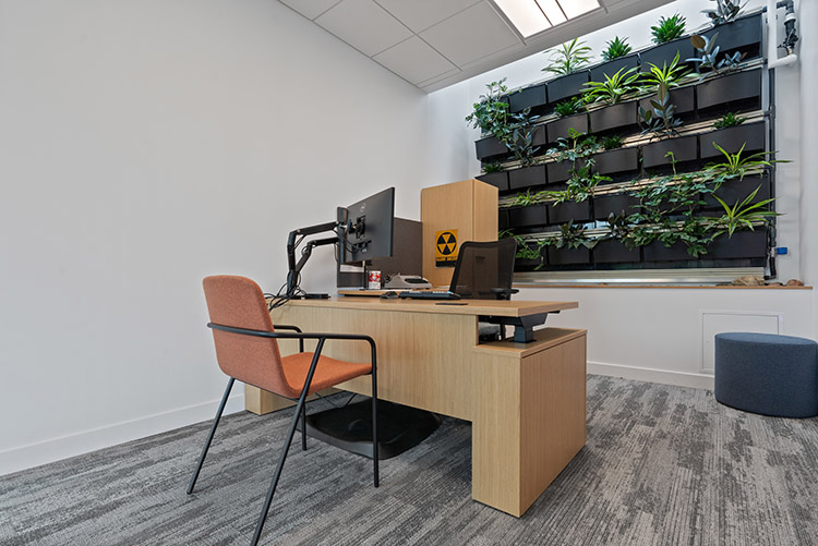 One of the offices. This one contains a plant wall. (Clay Whisler photo) 2024/07/stanley-center-2024-137-CW-750x500-1.jpg 