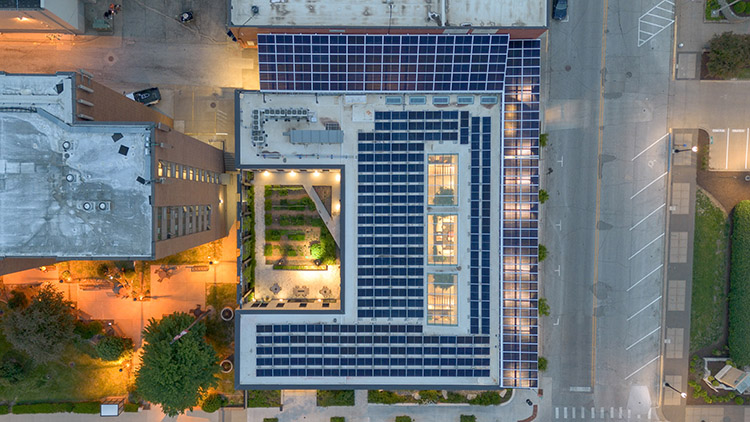 Drone view of the solar array on the roof. (Clay Whisler photo) 2024/07/stanley-center-2024-170-CW-750x500-1.jpg 